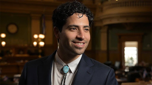 Manny Rutinel smiling inside the Colorado State Capitol